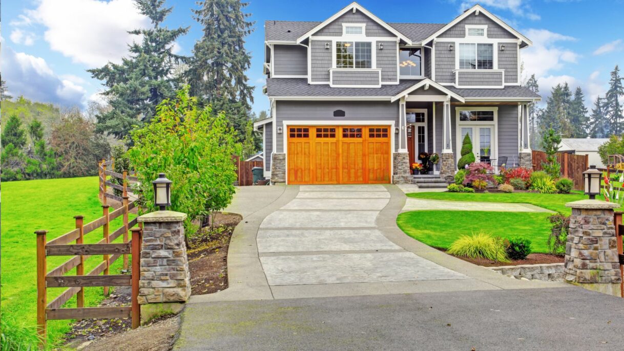 A charming rural house surrounded by nature, featuring a well-maintained roof, windows, and exterior. Empire Contractors LLC provides expert roofing, window, and gutter services in Cincinnati, OH, and surrounding areas to keep homes protected and beautiful.